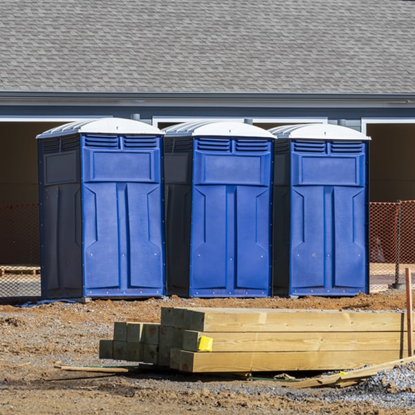 what is the cost difference between standard and deluxe porta potty rentals in Flint Creek